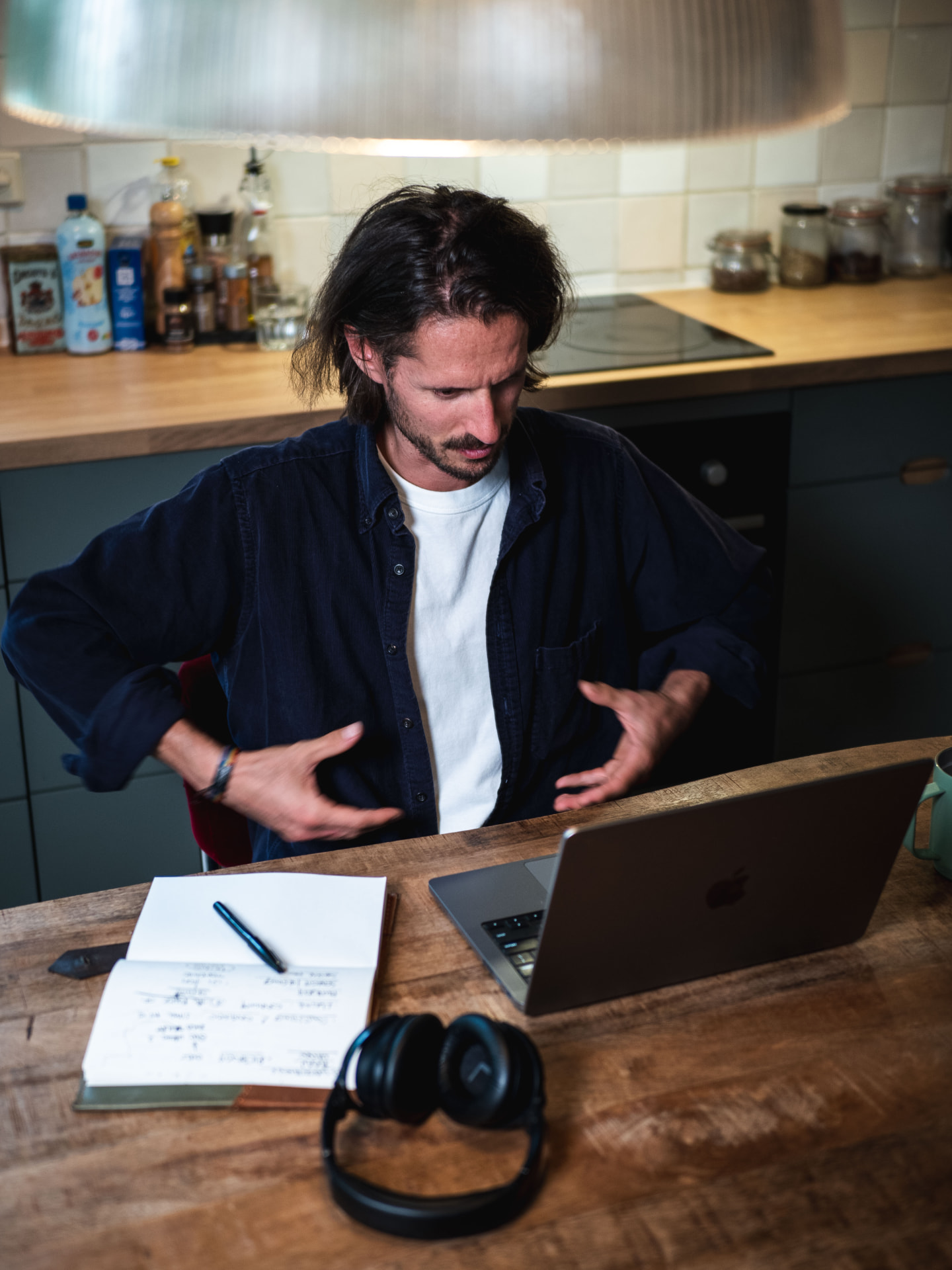 Tamas guiding an online breathwork session from his laptop